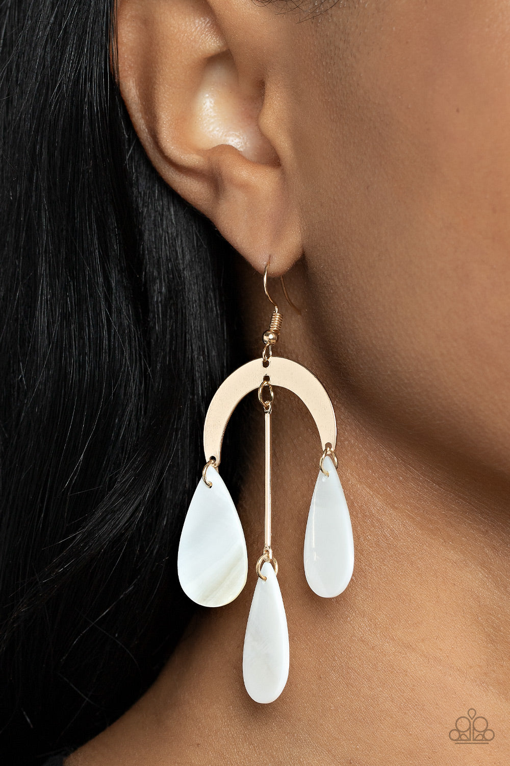 Paparazzi Atlantis Ambience - Gold Earrings qhite shell-like teardrops trickle from the bottom of a gold rod and gold half moon frame, creating an ocean inspired chandelier. Earring attaches to a standard fishhook fitting.  Sold as one pair of earrings.