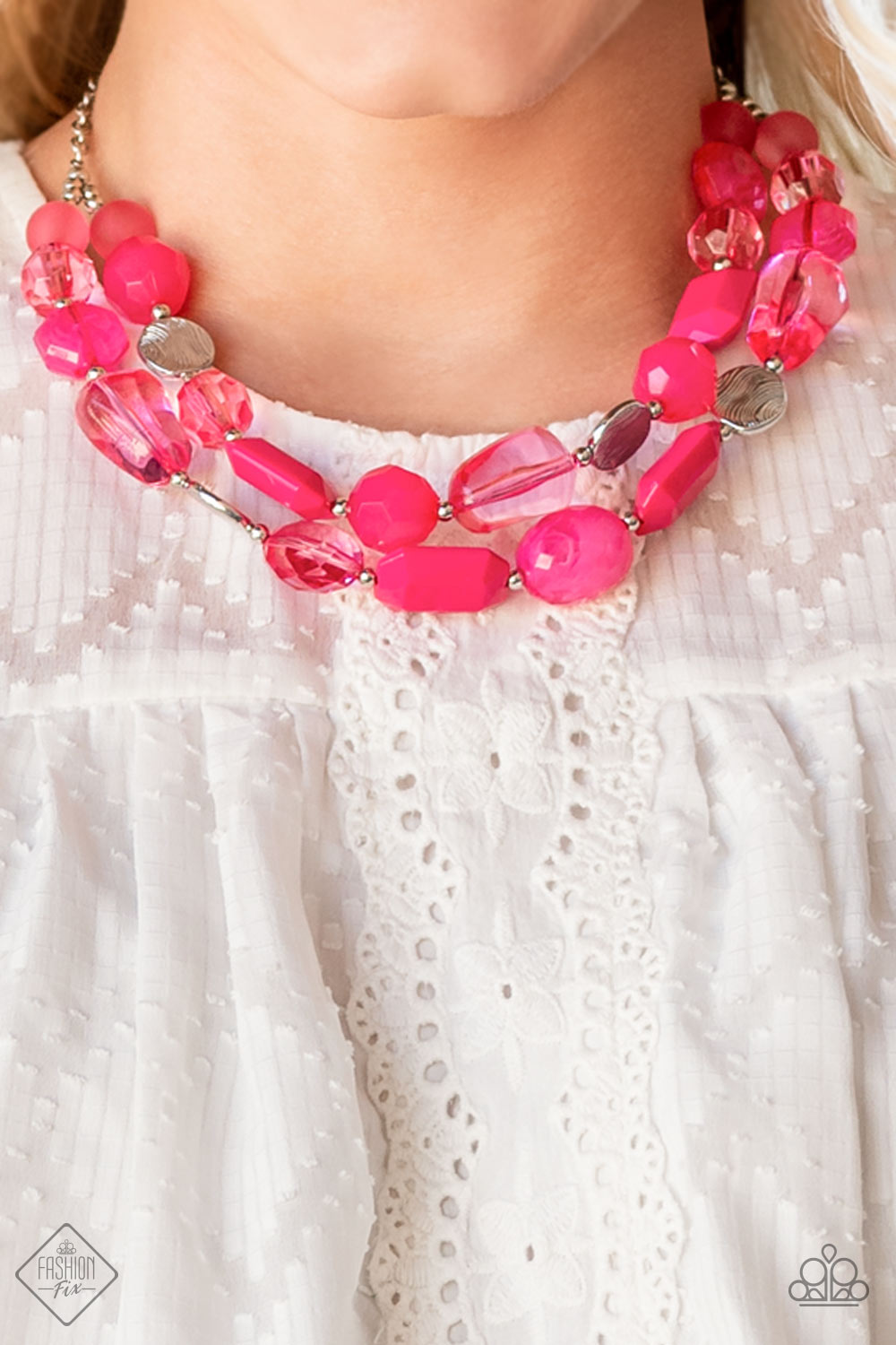 Oceanic Opulence - Pink Necklace varying in shape and opacity, a vibrant collection of faceted and smooth Raspberry Sorbet beads join textured silver discs and dainty silver beads along two thin wires, layering into a flamboyant pop of color below the collar. Features an adjustable clasp closure.  Sold as one individual necklace. Includes one pair of matching earrings.