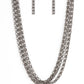 Paparazzi Accessories - Dynamite Dynamo - Black Chain Necklaces layer after layer of edgy gunmetal chains drape across the chest, creating an intense industrial display. Features an adjustable clasp closure.  Sold as one individual necklace. Includes one pair of matching earrings.