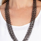 Paparazzi Accessories - Dynamite Dynamo - Black Chain Necklaces layer after layer of edgy gunmetal chains drape across the chest, creating an intense industrial display. Features an adjustable clasp closure.  Sold as one individual necklace. Includes one pair of matching earrings.