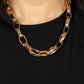 Motley in Motion - Gold Link Necklaces wide hammered gold links alternate with double sets of shiny gold links as they connect across the collar for an edgy industrial effect. Features an adjustable clasp closure.  Sold as one individual necklace. Includes one pair of matching earrings.