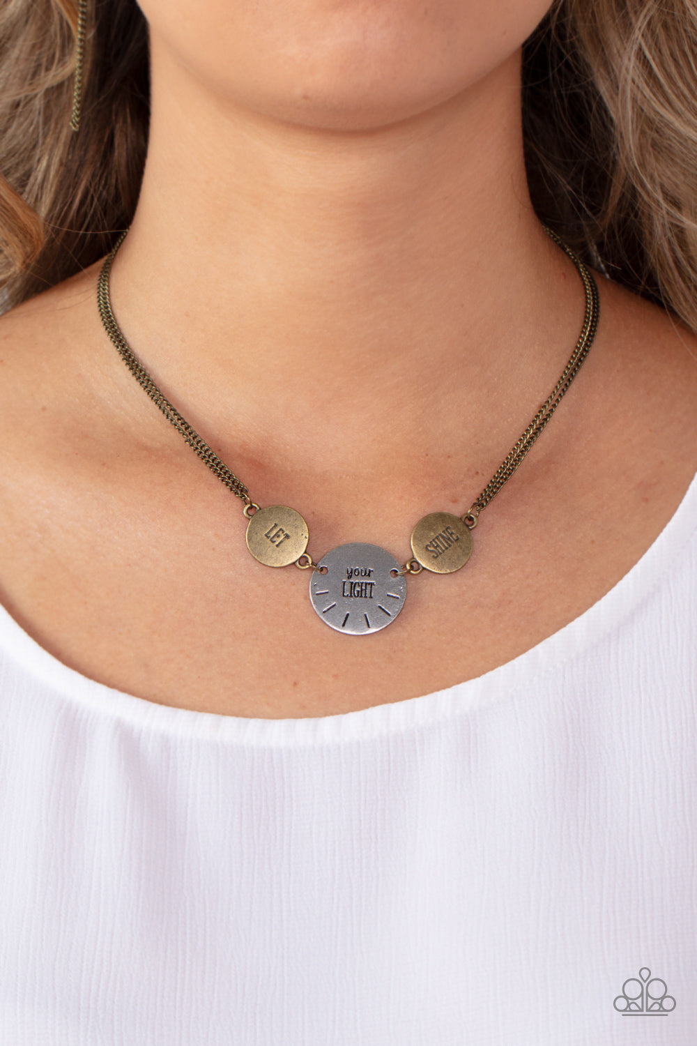Paparazzi Accessories - Shine Your Light - Brass Necklaces individually stamped in "Let," "Your Light," Shine," a pair of rustic brass discs links with a single silver disc, combining into an inspirational phrase below the collar. Features an adjustable clasp closure.  Sold as one individual necklace. Includes one pair of matching earrings.