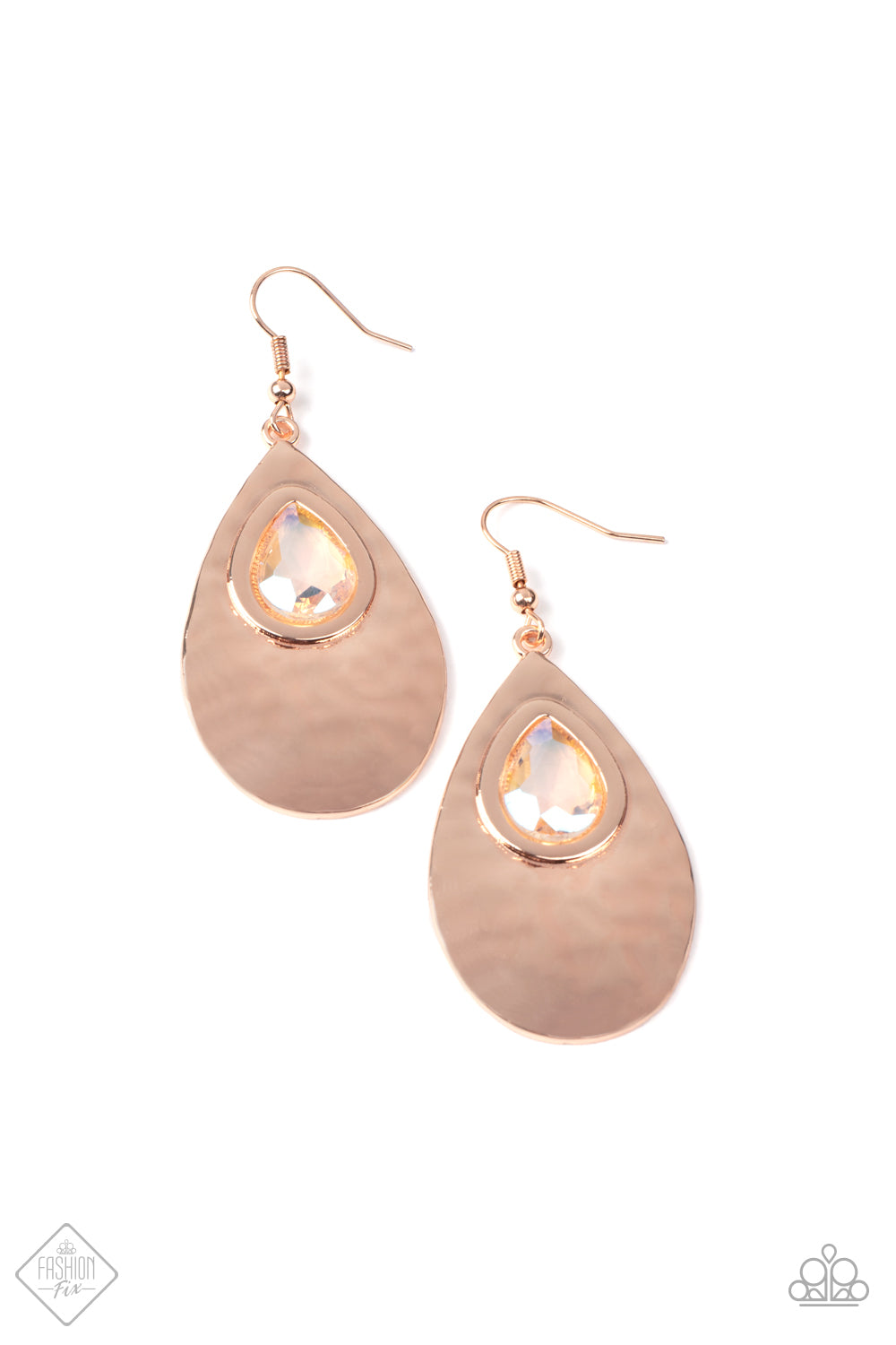 Tranquil Trove - Rose Gold Earrings shiny rose gold teardrop is hammered in texture, creating a radiant display as the light bounces off each beveled surface. A faceted iridescent teardrop gem with Pale Rosette undertones is pressed into the top of the rose gold frame in an enchanting finish. Earring attaches to a standard fishhook fitting.  Sold as one pair of earrings.  Paparazzi Jewelry is lead and nickel free so it's perfect for sensitive skin too!