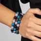 Paparazzi Accessories - Poshly Packing - Multi Bracelets a posh collection of polished multicolored beads, studded gunmetal rings, white rhinestone encrusted rings, and hematite dotted beads are threaded along stretchy bands around the wrist, creating sassy layers.  Sold as one set of three bracelets.
