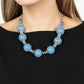 Paparazzi Accessories - Race to the Pop - Blue Necklaces an oversized collection of glassy Spring Lake beads and shiny silver discs are threaded along an invisible wire, creating a dramatic pop of color below the collar. Features an adjustable clasp closure.  Sold as one individual necklace. Includes one pair of matching earrings.