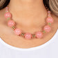 Paparazzi Accessories - Race to the Pop - Pink Necklaces an oversized collection of glassy Pale Rosette beads and shiny gold discs are threaded along an invisible wire, creating a dramatic pop of color below the collar. Features an adjustable clasp closure.  Sold as one individual necklace. Includes one pair of matching earrings.