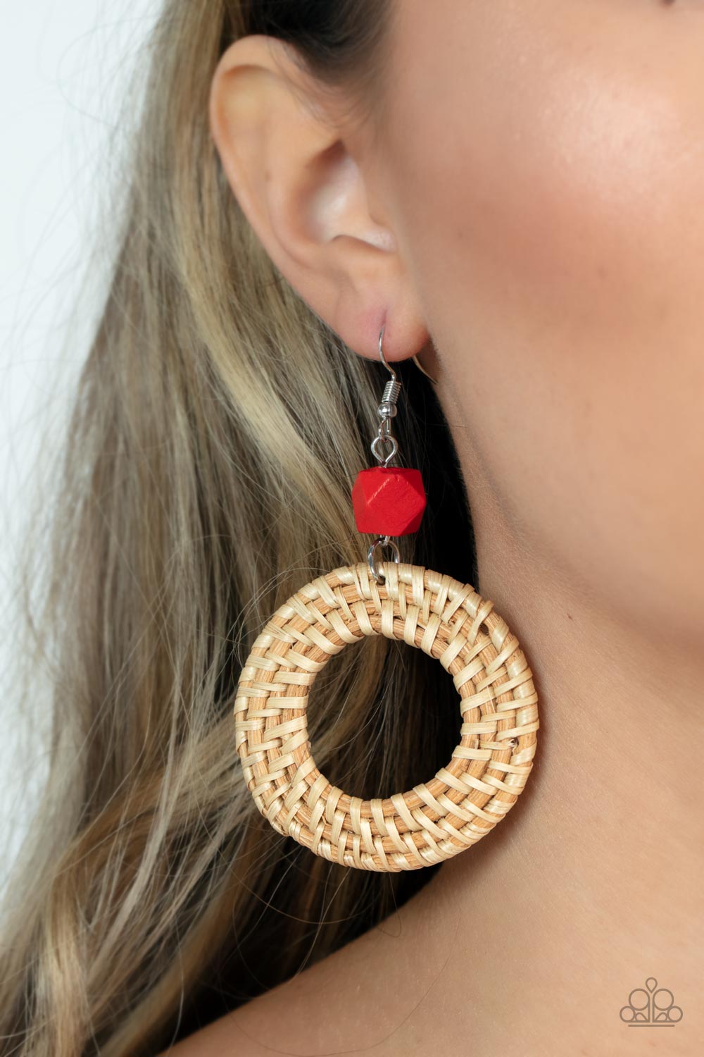 Paparazzi Accessories - Wildly Wicker - Red Earrings a wicker-like hoop swings from the bottom of a faceted red wooden bead, adding an earthy twist to the trendy homespun trinket. Earring attaches to a standard fishhook fitting.  Featured inside The Preview at GLOW! Sold as one pair of earrings.
