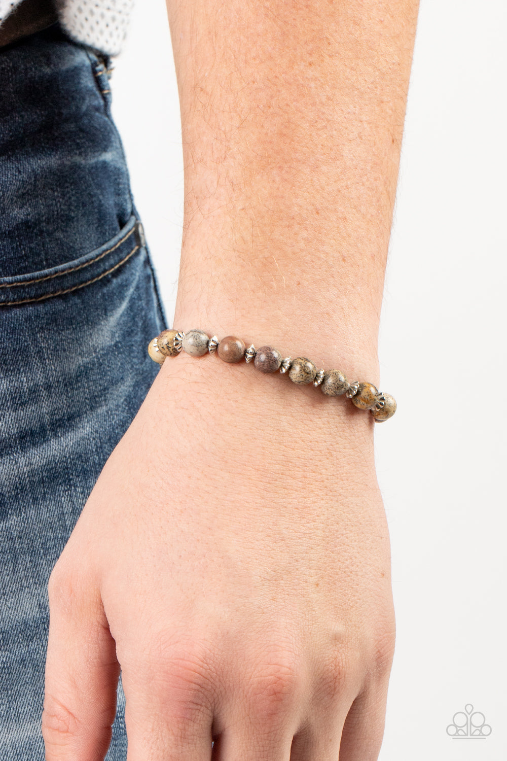Keep the Peace - Silver Natural Stone Bracelets infused with silver accents, an earthy collection of natural stones are threaded along a stretchy band around the wrist for a tranquil look.  Sold as one individual bracelet.