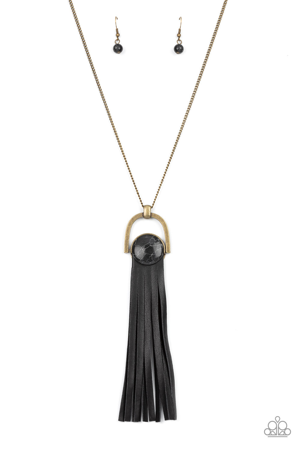 Winslow Wanderer - Brass and Leather Necklaces strips of black leather fan out from the bottom of a round black stone that is threaded along a metal rod that attaches to the bottom of a brass horseshoe frame. The earthy pendant swings from the bottom of an extended brass chain, resulting in a wildly wonderful tassel. Features an adjustable clasp closure.  Sold as one individual necklace. Includes one pair of matching earrings.