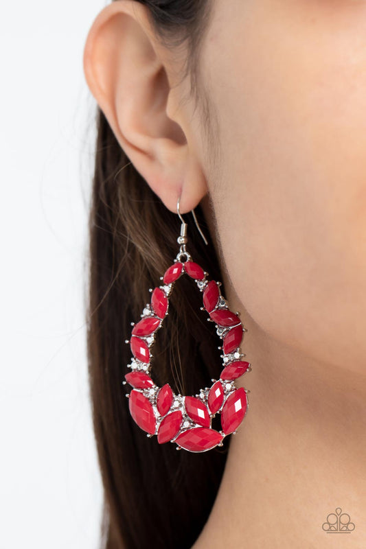 Tenacious Treasure - Red Beaded Earrings - Paparazzi Accessories featuring pronged silver fittings, a glimmering collection of faceted Fire Whirl marquise beads coalesce into a glamorous teardrop. Faceted silver accents are sprinkled through the design, adding a spritz of metallic shimmer. Earring attaches to a standard fishhook fitting.  Sold as one pair of earrings.