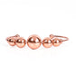 Paparazzi Accessories - Bead Creed - Copper Cuff Bracelets gradually increasing in size, an oversized collection of shiny copper beads are threaded along a dainty shiny copper cuff for a dramatic industrial display.  Sold as one individual bracelet.