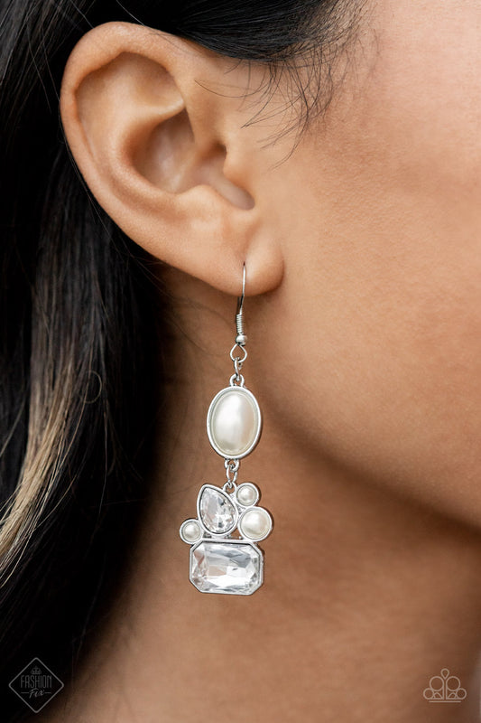 Showtime Twinkle - White Pearl Earrings elegant white oval pearl bead encased in a sleek silver frame gives way to an asymmetrical collection of bubbly pearl beads and sparkling teardrop and emerald cut rhinestones, resulting in an exquisite lure. Earring attaches to a standard fishhook fitting.  Sold as one pair of post earrings.