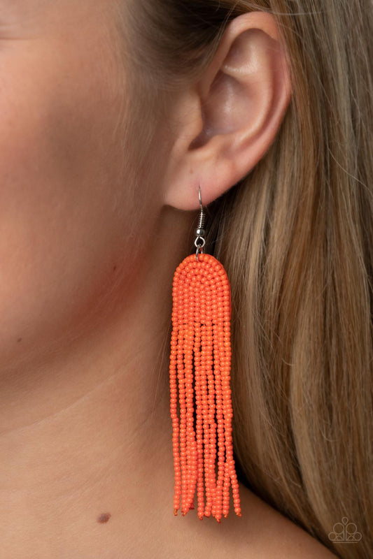 Paparazzi Accessories - Right as Rainbow - Orange Seed Bead Earrings strands of Burnt Orange seed beads gently curve into the arch of a rainbow, resulting in a tasseled bohemian fashion. Earring attaches to a standard post fitting.  Sold as one pair of earrings.