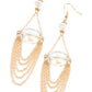 Ethereally Extravagant - Gold Chain Earrings tiers of dainty gold chains delicately layer from an oversized oval iridescent gem that is suspended from a faceted white crystal-like bead, resulting in an ethereal chandelier. Earring attaches to a standard fishhook fitting.  Sold as one pair of earrings.