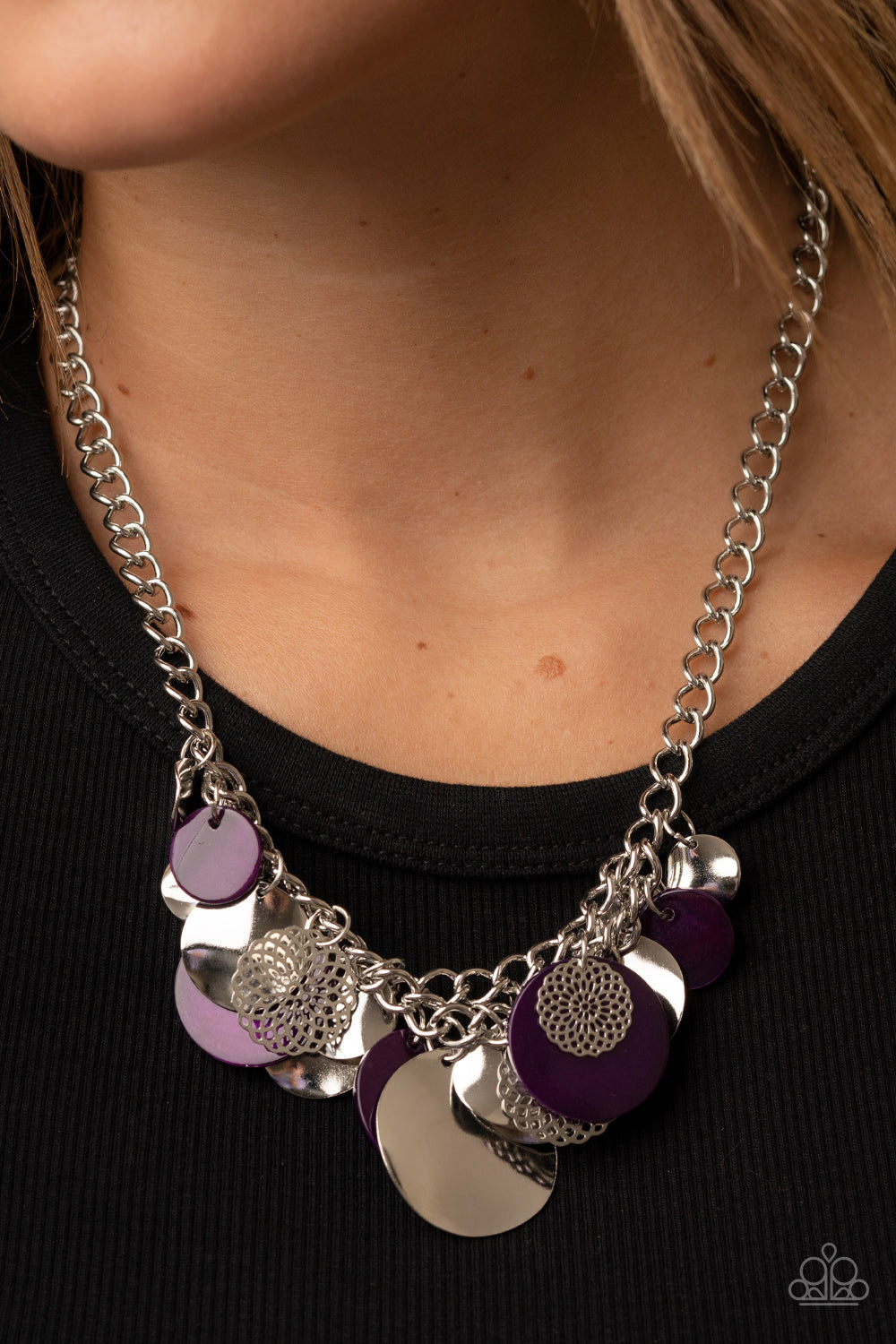 Paparazzi Accessories - Oceanic Opera - Purple Necklaces a summery collection of bent silver discs, plum shell-like discs, and silver mandala-like accents cascades from a pair of layered silver chains, resulting in a bubbly and boisterous fringe below the collar. Features an adjustable clasp closure.  Sold as one individual necklace. Includes one pair of matching earrings.