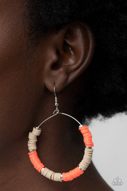 Paparazzi Accessories - Skillfully Stacked - Orange Earrings infused with dainty silver accents, an earthy collection of rubbery tan and orange discs are threaded along a dainty silver wire hoop for a colorful look. Earring attaches to a standard fishhook fitting.  Sold as one pair of earrings.
