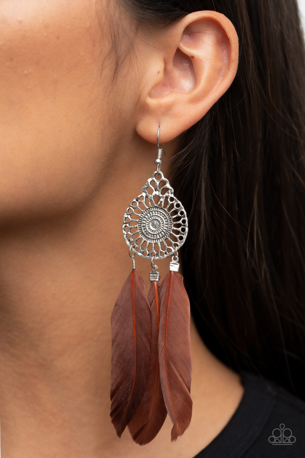 Paparazzi Accessories - Pretty in Plumes - Brown Feather Earrings three brown feathers swing from the bottom of a dizzying silver frame featuring airy filigree detail, resulting in a flirtatiously colorful fringe. Earring attaches to a standard fishhook fitting.  Sold as one pair of earrings.