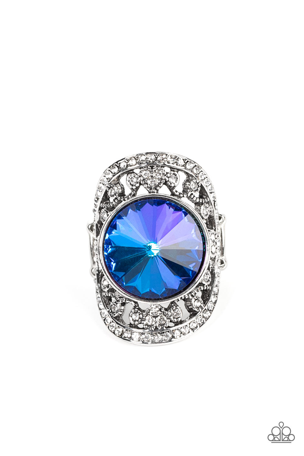 Paparazzi Accessories - Galactic Garden - Blue Gem Ring a dramatically oversized, iridescent blue gem is pressed into the center of an oval silver frame dotted and bordered in glassy white rhinestones, resulting in a sparkly filigree-filled centerpiece atop the finger. Features a stretchy band for a flexible fit. Due to its prismatic palette, color may vary.  Sold as one individual ring.