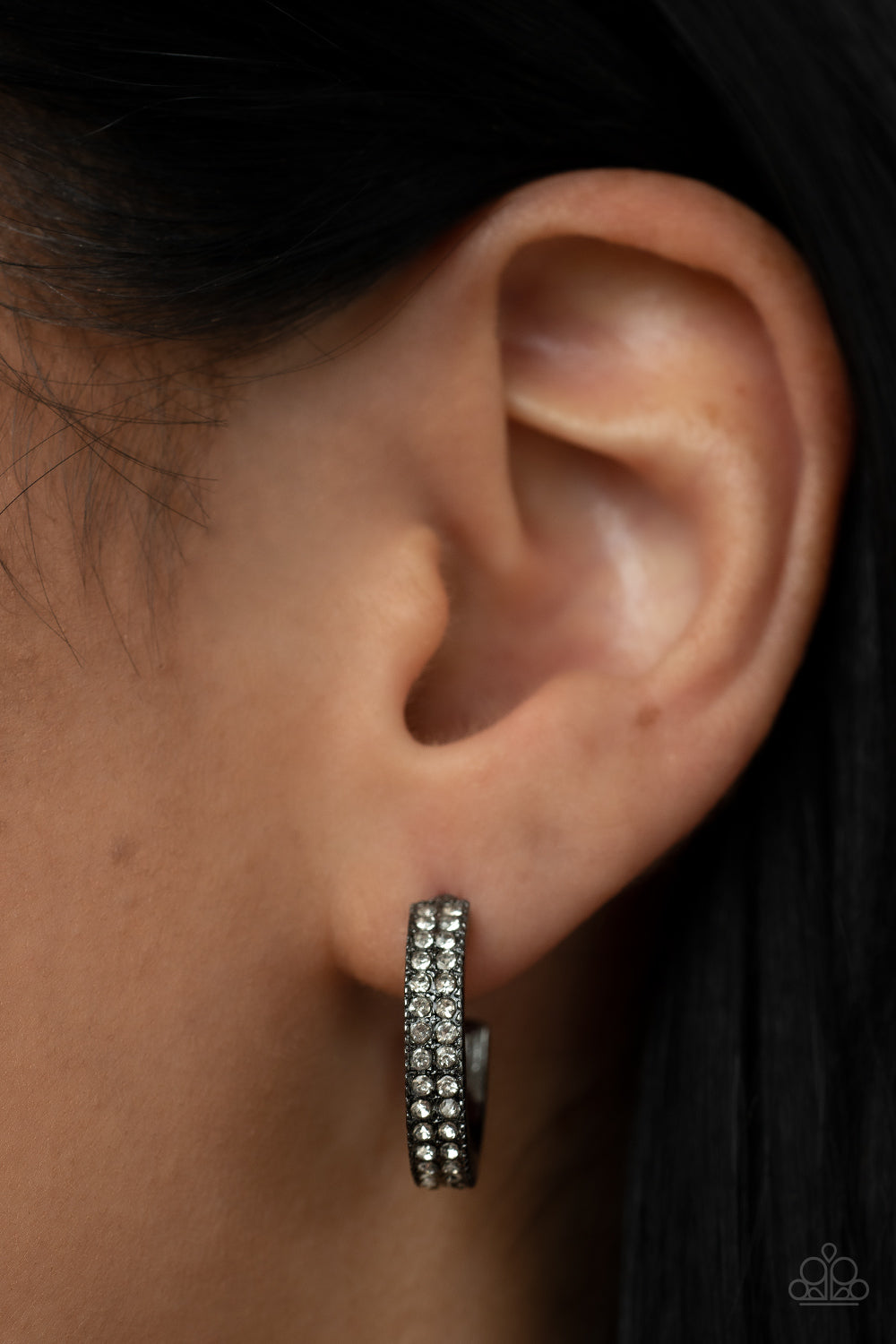 Small Town Twinkle - Black Dainty Hoop Earrings two rows of glassy white rhinestones encrust the front of a dainty gunmetal hoop, resulting in a timeless twinkle. Earring attaches to a standard post fitting. Hoop measures approximately 3/4" in diameter.  Sold as one pair of hoop earrings.