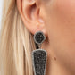 Paparazzi Accessories - Druzy Desire - Silver Rhinestone Earrings featuring asymmetrical and triangular cuts, a pair of black druzy-like accents are encased inside white rhinestone dotted silver frames as they link into a jaw-dropping lure. Earring attaches to a standard post fitting.  Sold as one pair of post earrings.