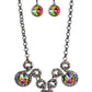 Paparazzi Accessories Hypnotized - Multi Life of the Party Exclusive Necklaces three dramatically oversized oil spill rhinestones are nestled into three textured gunmetal fittings that are connected by oval gunmetal rings, creating a brilliant statement piece. Features an adjustable clasp closure.  Sold as one individual necklace. Includes one pair of matching earrings.