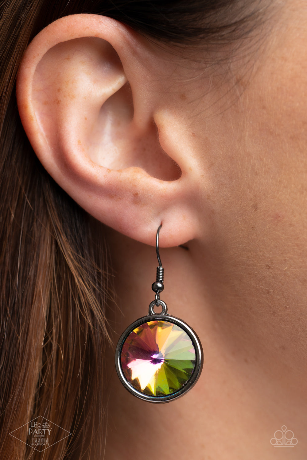 Paparazzi Accessories Hypnotized - Multi Life of the Party Exclusive Necklaces three dramatically oversized oil spill rhinestones are nestled into three textured gunmetal fittings that are connected by oval gunmetal rings, creating a brilliant statement piece. Features an adjustable clasp closure.  Sold as one individual necklace. Includes one pair of matching earrings.
