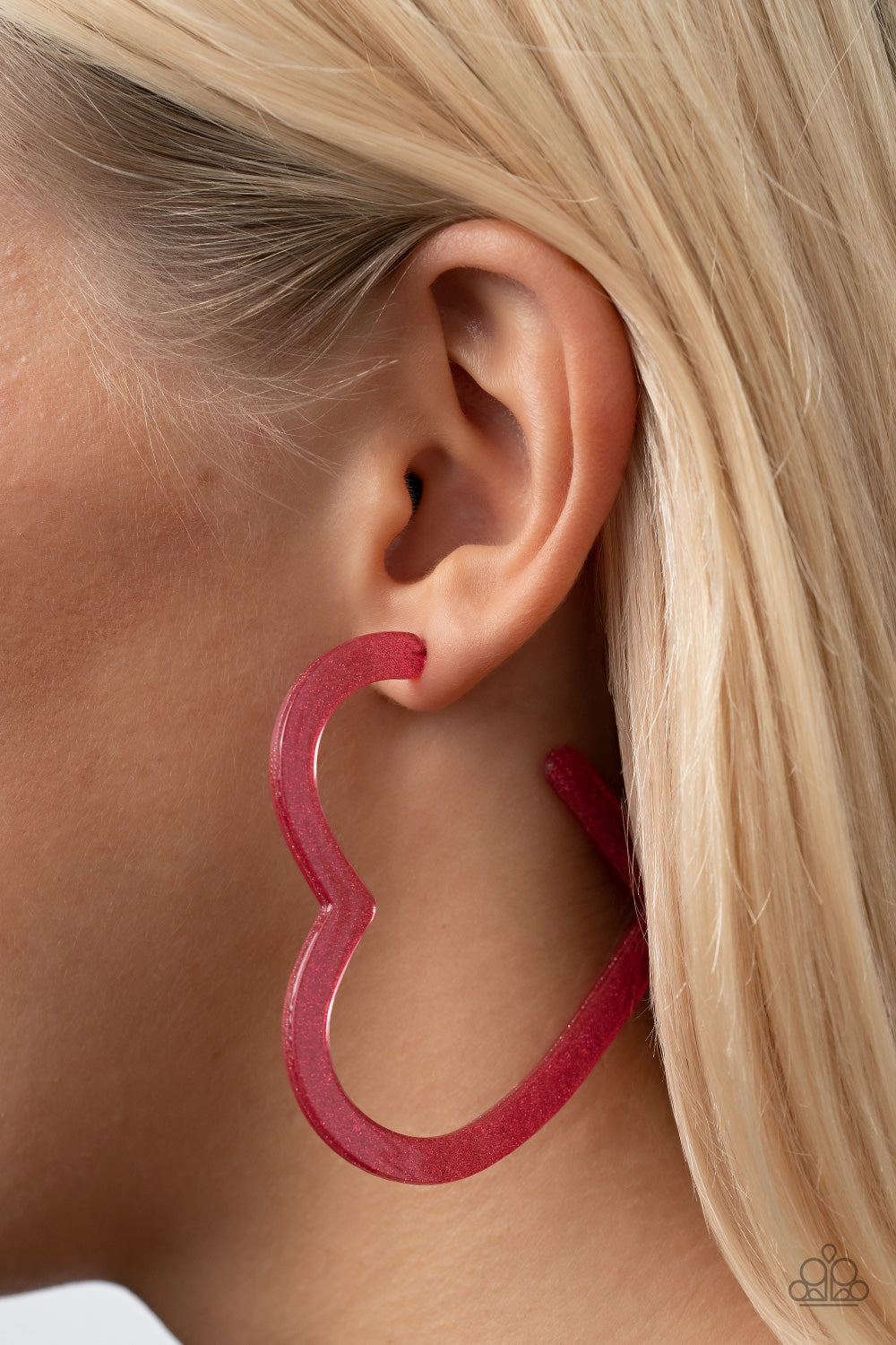 Heart-Throbbing Twinkle - Pink Acrylic Heart Hoop Earrings dusted in sparkles, a pink acrylic frame delicately curls into a flat heart frame for a flirtatious finish. Earring attaches to a standard post fitting. Hoop measures approximately 2 1/2" in diameter.  Sold as one pair of hoop earrings.