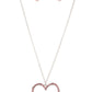 Va-Va Valentine - Pink Rhinestone Heart Necklaces an oversized silver heart frame is embellished with Pale Rosette rhinestones, resulting in a flirtatious pendant at the bottom of an extended silver chain. Features an adjustable clasp closure. Sold as one individual necklace. Includes one pair of matching earrings.