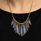 Paparazzi Accessories Bohemian Breeze - Blue Necklace flanked by dainty gold beads, cylindrical gold and glassy Spring Lake beads alternate along a gold beaded chain, fanning out into a colorful fringe below the collar. Features an adjustable clasp closure.  Sold as one individual necklace. Includes one pair of matching earrings.