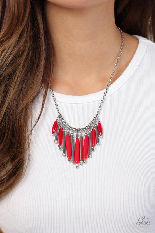Paparazzi Accessories - Bohemian Breeze - Red Necklace flanked by dainty silver beads, cylindrical silver and glassy and opaque red beads alternate along a silver beaded chain, fanning out into a colorful fringe below the collar. Features an adjustable clasp closure.  Sold as one individual necklace. Includes one pair of matching earrings.