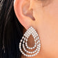 Paparazzi Accessories Take a POWER Stance - White Rhinestone Convention Earrings loops of glassy white rhinestones ripple out from the bottom of a stationary triangular fitting that is dotted in glittery white rhinestones, resulting in a timeless teardrop chandelier. Earring attaches to a standard post fitting.  Sold as one pair of post earrings.  2022 Glow Convention 