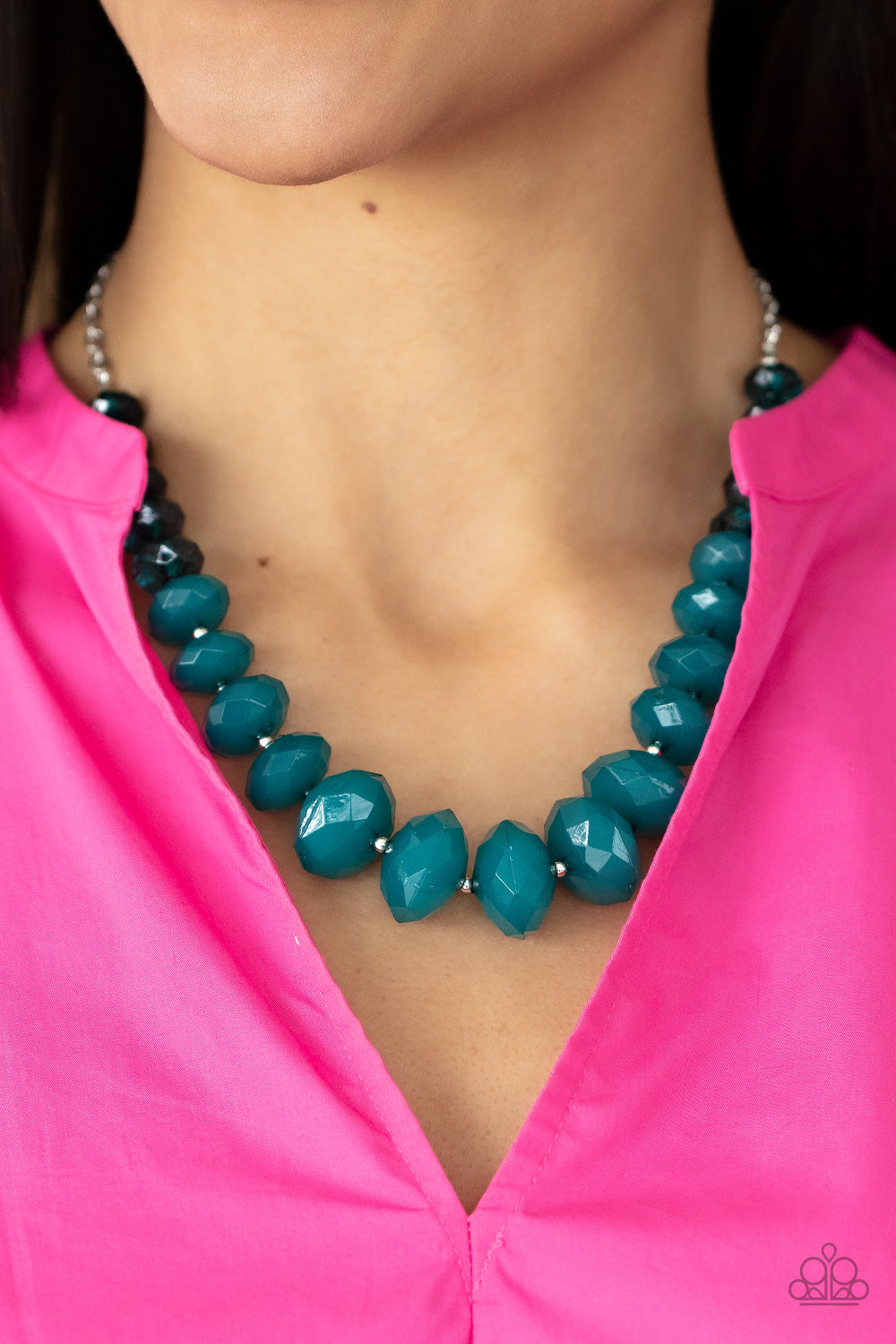 Separated by dainty silver beads, glassy Harbor Blue crystal-like beads gradually morph into opaque Harbor Blue crystal-like beads below the collar. The refreshing compilation grows in size and intensity further below the collar, adding dramatic dimension to the colorful centerpiece. Features an adjustable clasp closure.  Sold as one individual necklace. Includes one pair of matching earrings.