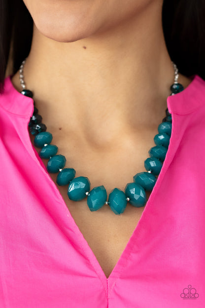 Separated by dainty silver beads, glassy Harbor Blue crystal-like beads gradually morph into opaque Harbor Blue crystal-like beads below the collar. The refreshing compilation grows in size and intensity further below the collar, adding dramatic dimension to the colorful centerpiece. Features an adjustable clasp closure.  Sold as one individual necklace. Includes one pair of matching earrings.