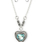 Paparazzi Heart Full of Fabulous - Blue Heart Necklaces bordered in spun silver ribbons, an oversized blue heart gem is pressed into a silver heart frame below the collar. The flirtatious pendant attaches to silver rings and decorative silver frames dotted in white rhinestones, resulting in a dash of vintage inspired romance. Features an adjustable clasp closure.  Sold as one individual necklace. Includes one pair of matching earrings.