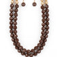 Paparazzi Accessories - Greco Getaway - Brown Necklaces faceted Coca Mocha and golden acrylic beads are threaded along invisible wires below the collar, creating a modern pop of color.  Sold as one individual necklace. Includes one pair of matching earrings.  Get The Complete Look! Bracelet: "Grecian Glamour - Brown" (Sold Separately)