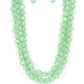 Boundless Bliss - Green Opaque Bead Necklaces featuring faceted gem-like cuts, opaque Basil crystal-like beads are threaded along layers of thread below the collar for a dreamy pop of color. Features an adjustable clasp closure.  Sold as one individual necklace. Includes one pair of matching earrings.
