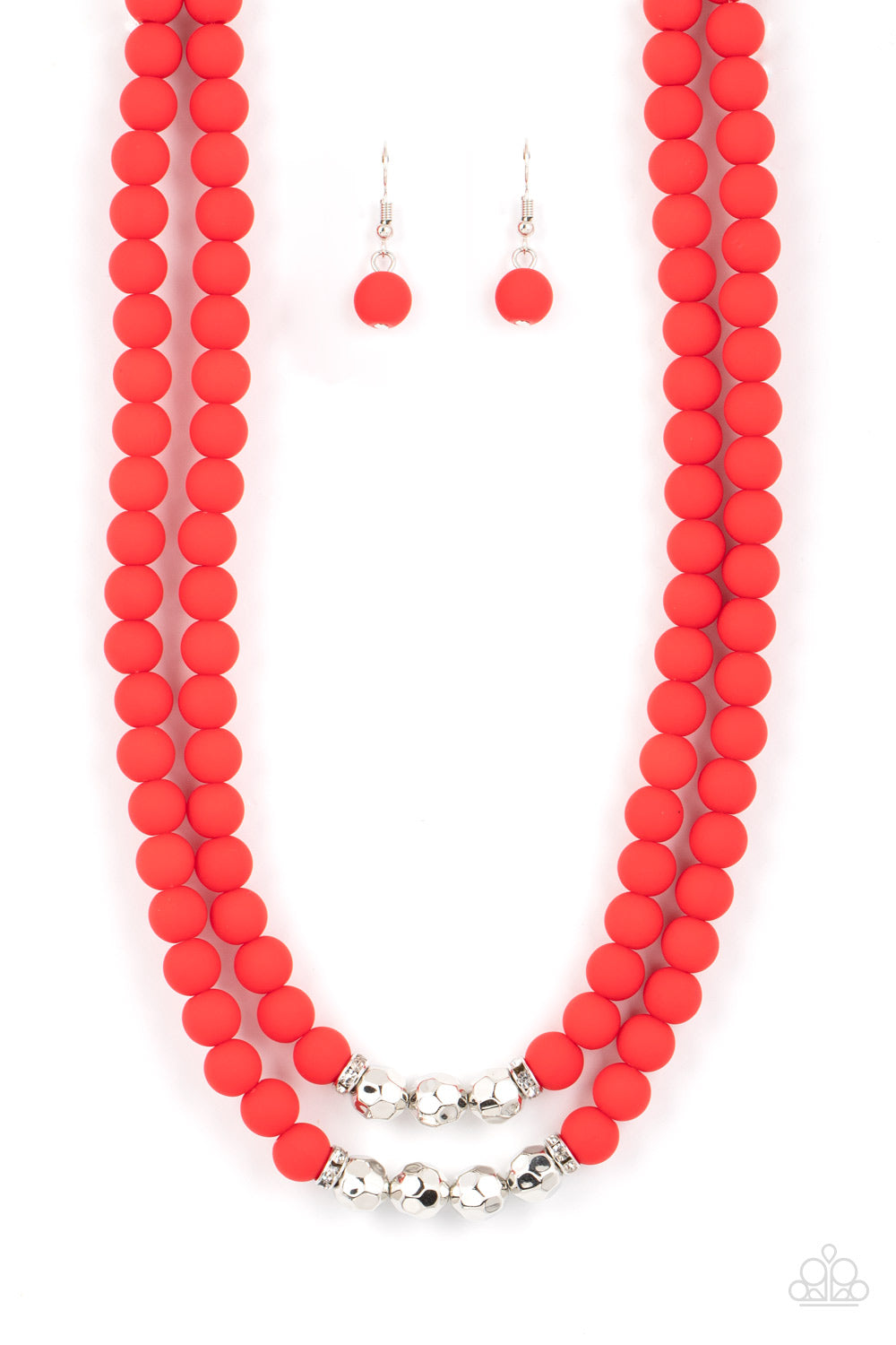 Threaded along invisible wires, matte-finished Poinciana beads give way to center sections of white rhinestone encrusted rings and faceted silver beads. The vivacious display layers below the collar, creating a summery splash of color. Sold as one individual necklace. Includes one pair of matching earrings. he wrist. White rhinestone encrusted rings flank a trio of faceted silver beads along a stretchy row of matte-finished Poinciana beads, creating a summery splash of color around the wrist.
