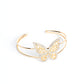 Paparazzi Butterfly Bella - Gold Butterfly Bracelets bordered in glassy white rhinestones, an airy gold butterfly is dotted in dainty white rhinestones and shiny gold emerald-like accents as it flutters atop a layered gold cuff for an enchanting fashion.  Sold as one individual bracelet.