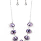 Unleash Your Sparkle - Purple Rhinestone Necklaces dainty rows of glittery white rhinestones gently curve around the bottoms of oversized Very Peri oval gems. The sparkly frames delicately connect below the collar, creating a colorful centerpiece. Features an adjustable clasp closure.  Sold as one individual necklace. Includes one pair of matching earrings.