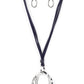 Paparazzi Accessories - Long OVAL-due - Silver Necklace long strips of navy blue leather knot around a silver link where a mismatched pair of smooth and hammered silver ovals swing from the bottom, resulting in a rustic pendant. Features an adjustable clasp closure.  Sold as one individual necklace. Includes one pair of matching earrings.