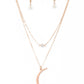 Rose Gold Necklaces two dainty rose gold chains delicately layer below the collar. A white crystal-like bead sparkles at the center of the uppermost chain while a rose gold half moon pendant swings from the bottom of the display for a mystical finish. Features an adjustable clasp closure.  Sold as one individual necklace. Includes one pair of matching earrings.