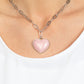 Paparazzi Accessories - Everlasting Endearment - Pink Heart Necklaces chiseled into a charming heart, a rose quartz-like gemstone is pressed into the center of a silver fitting at the bottom of a silver oval chain for a sentimental statement. Features an adjustable clasp closure.  Sold as one individual necklace. Includes one pair of matching earrings.