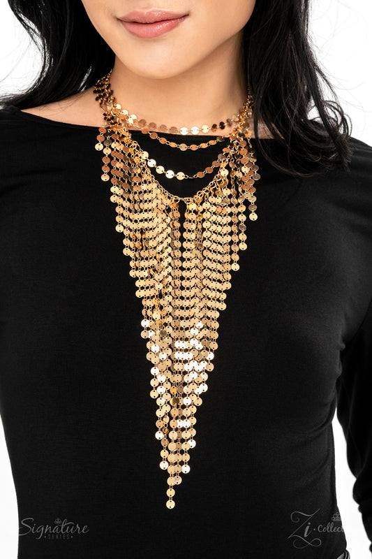 Paparazzi Accessories The Suz - 2022 Signature Zi Collection Necklace seemingly infinite collection of dainty gold discs flickers and flashes as they catch the light, draping into four shimmery rows down the chest. Twinkly tassels of matching gold discs stream out from the bottom of the lowermost row, tapering into a hypnotic fringe that glints and glimmers, creating its own spotlight. Features an adjustable clasp closure.  Sold as one individual necklace. Includes one pair of matching earrings.