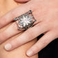 Paparazzi Accessories - Starry Serenity - Multi Rings a white iridescent rhinestone-dotted star twinkles behind a glassy pane that seemingly floats atop the pronged frame, resulting in a stellar statement piece. Due to its prismatic palette, color may vary. Features a stretchy band for a flexible fit.  Sold as one individual ring.