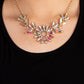 Paparazzi Accessories Celestial Cruise - Gold Iridescent Necklaces featuring oblong marquise cuts, a collection of iridescent gems join into leafy gold frames below the collar. Radiating with the same iridescent intensity, even more stellar rhinestones fan out into a circular focal point, resulting in a celestial centerpiece. Features an adjustable clasp closure. Due to its prismatic palette, color may vary.  Sold as one individual necklace. Includes one pair of matching earrings.