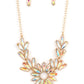Paparazzi Accessories Celestial Cruise - Gold Iridescent Necklaces featuring oblong marquise cuts, a collection of iridescent gems join into leafy gold frames below the collar. Radiating with the same iridescent intensity, even more stellar rhinestones fan out into a circular focal point, resulting in a celestial centerpiece. Features an adjustable clasp closure. Due to its prismatic palette, color may vary.  Sold as one individual necklace. Includes one pair of matching earrings.