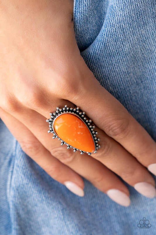 Paparazzi Accessories Down-To-Earth- Essence - Orange Stone Ring chiseled into a tranquil teardrop, a refreshing orange stone is pressed into the center of a studded silver frame for an earthy ensemble. Features a stretchy band for a flexible fit.  Sold as one individual ring.
