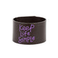 Paparazzi Accessories - Simply Stunning - Purple Inspirational Bracelets a thick band of dark brown leather is stamped in the phrase, "Keep Life Simple," in purple script. The playful font emphasizes the lighthearted message as the band wraps around the wrist in a casual finish. Features an adjustable snap closure.  Sold as one individual bracelet.