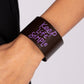 Paparazzi Accessories - Simply Stunning - Purple Inspirational Bracelets a thick band of dark brown leather is stamped in the phrase, "Keep Life Simple," in purple script. The playful font emphasizes the lighthearted message as the band wraps around the wrist in a casual finish. Features an adjustable snap closure.  Sold as one individual bracelet.