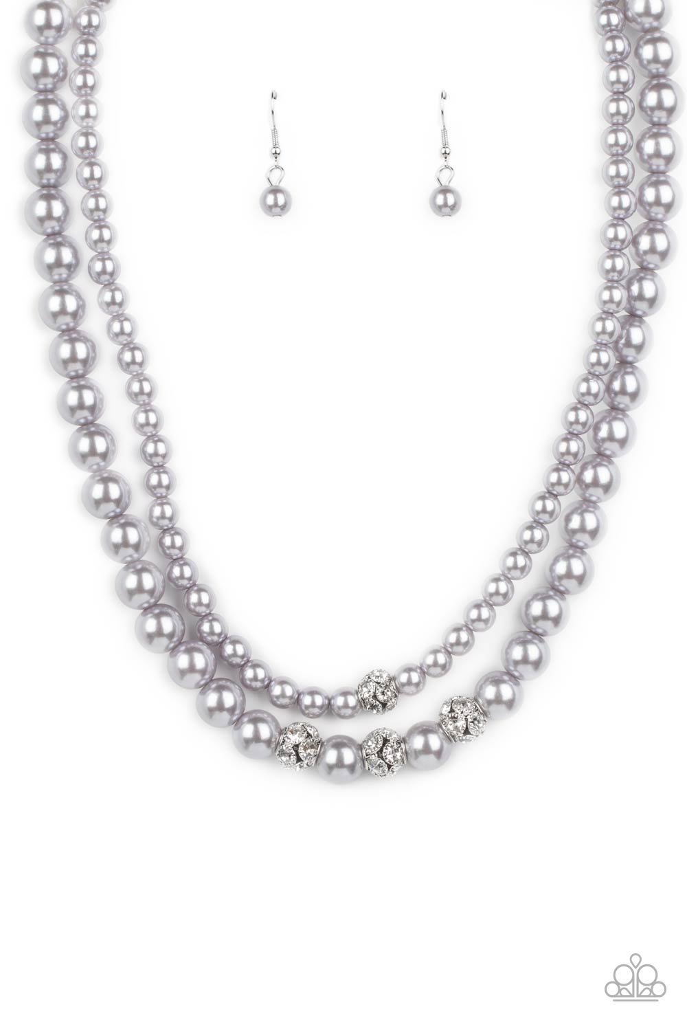 Paparazzi Accessories - Brilliant Ballerina - Silver Pearl Necklaces two strands of classic silver pearls in varying sizes coalesce around the collar in a refined fashion. Silver beads, encrusted in white rhinestones, introduce shimmery detail to each pearly layer, adding a playful spark of shimmer to the timeless design. Features an adjustable clasp closure.  Sold as one individual necklace. Includes one pair of matching earrings.